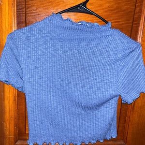 Darker blue, flash makes it look lighter.